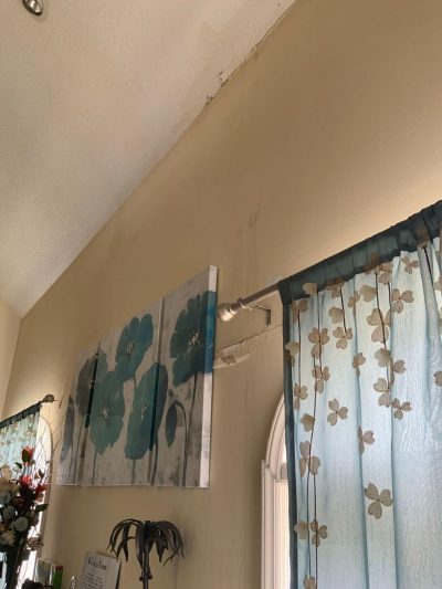 Should I address water stains and rot before repainting