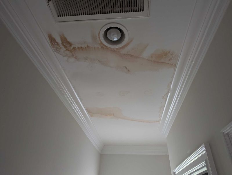 Water-stained ceiling from roof leak showing why documenting water damage is the first step for insurance claims